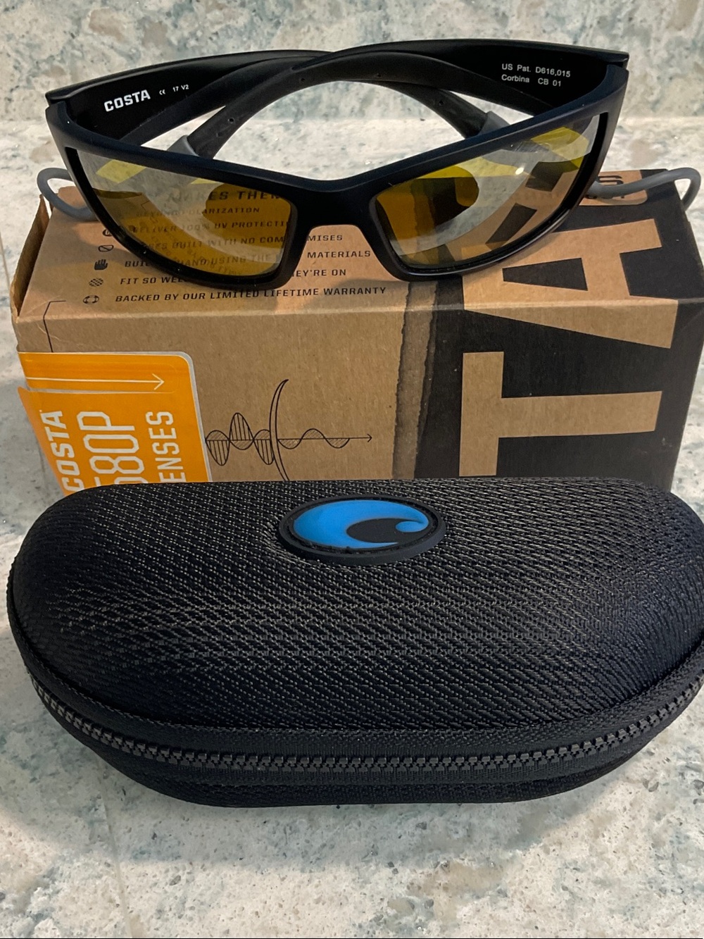 Costa Black Frame Sunglasses with Yellow Lenses